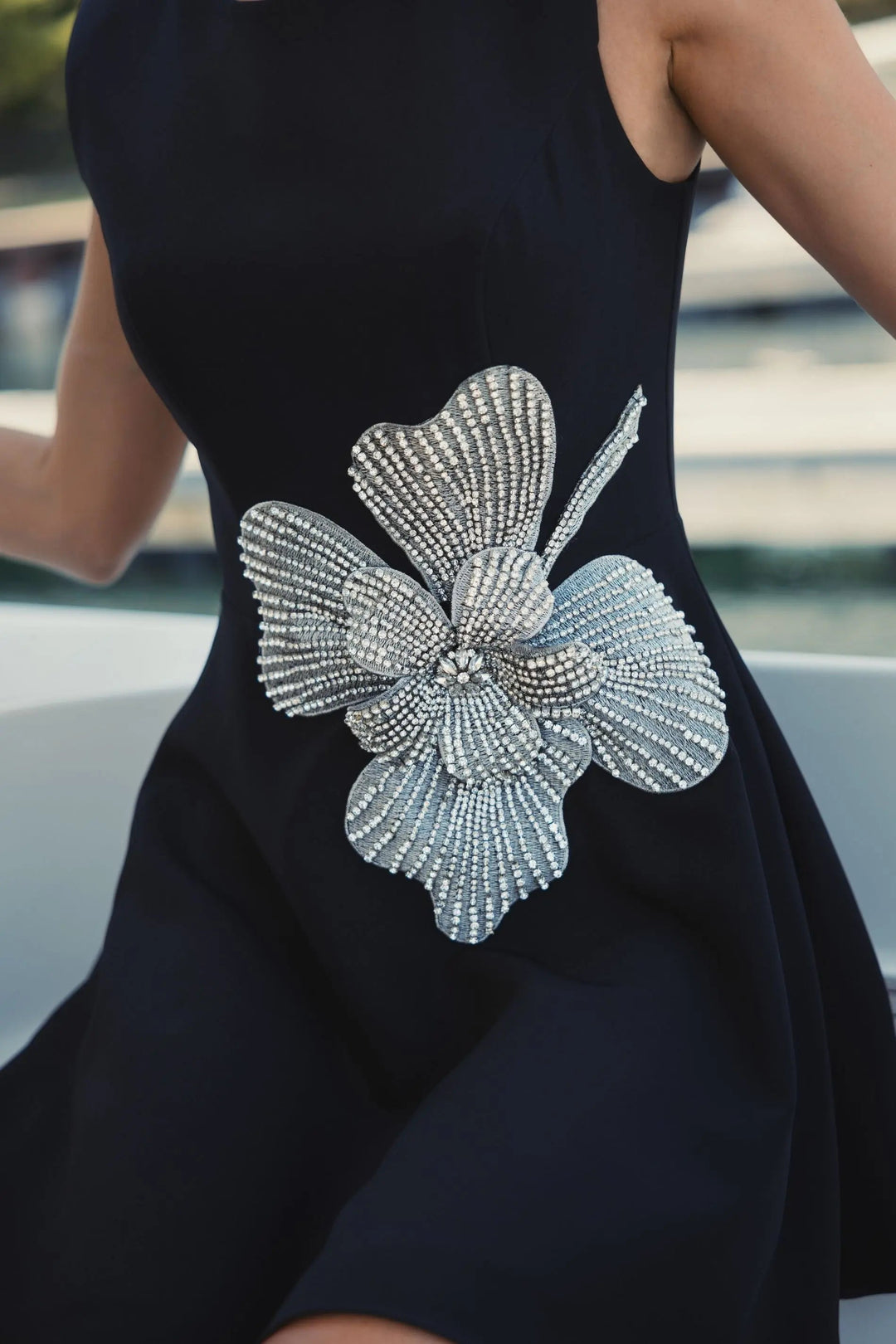 Black Sleeveless Crepe Mini Dress With Rhinestone Flower - FOSTANI.com