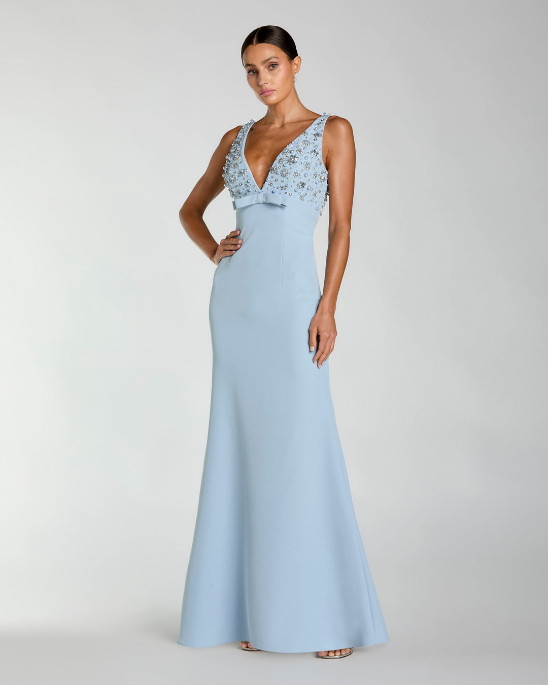 Blue Crepe Sleeveless Beaded V Neck Gown With Bow - FOSTANI.com