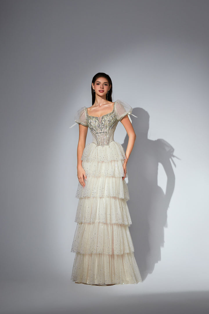 Delilah SH11607 Beaded Corset Gown with Puff Sleeves and Tiered Ruffle Skirt - White front view
